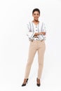 Full length portrait of a smiling young african businesswoman Royalty Free Stock Photo