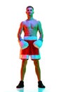 Full-length portrait of sportsman, boxer, mixed martial art fighter workout against white background in mixed neon Royalty Free Stock Photo