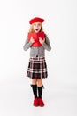 Full length portrait of a surprised little schoolgirl Royalty Free Stock Photo