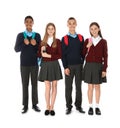 Full length portrait of teenagers in school uniform with backpacks