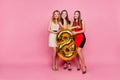 Full length portrait of three pretty girls, party time of stylis Royalty Free Stock Photo