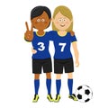 Full length portrait of two female soccer players hugging showing victory sign posing with ball