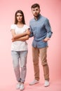 Full length portrait of an upset young couple Royalty Free Stock Photo