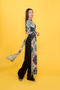 Full-length portrait of Vietnamese girl in ao-dai dress