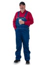Full length portrait of a worker in dungarees Royalty Free Stock Photo