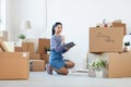 Young Asian Woman Organizing Boxes Royalty Free Stock Photo