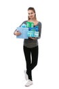 Full length portrait of young beautifu woman holding gift boxes