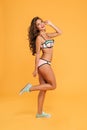 Full length portrait young beautiful girl in bikini posing Royalty Free Stock Photo