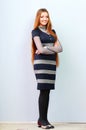 Full-length portrait of a young beautiful woman standing Royalty Free Stock Photo