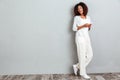 Full length portrait of young casual afro american woman Royalty Free Stock Photo