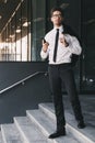 Full length portrait of young entrepreneur dressed in formal sui Royalty Free Stock Photo