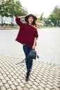 Full length portrait of a young joyful asian woman Royalty Free Stock Photo