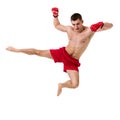 Full length portrait of young male boxer showing some movements against isolated white background Royalty Free Stock Photo