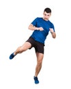 Full length portrait of young man athlete or fighter making a leg kick isolated over white background