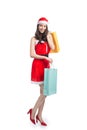Full length portrait of a young smiling asian woman holding shopping bags before christmas Royalty Free Stock Photo