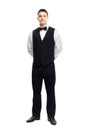 Full length portrait of young smiling waiter