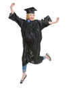 Young woman in graduation gown jumping Royalty Free Stock Photo