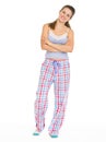 Full length portrait of young woman in pajamas