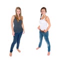 Full length portraits of two beautiful teenage girls, eighteen and nineteen years old Royalty Free Stock Photo