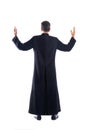 Full length priest blessing arm rear view