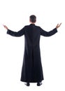 Full length priest blessing arm rear view