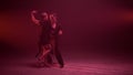 Full length professional couple dancing indoors. Dancers moving sensually. Royalty Free Stock Photo