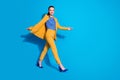 Full length profile photo of attractive worker lady walking corporate meeting conference wear yellow blazer suit pants