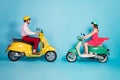 Full length profile photo of funny lady guy couple drive retro moped travelers opposite missed each other good mood glad Royalty Free Stock Photo