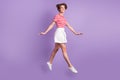 Full length profile photo of lady jump motion white smile wear striped t-shirt mini skirt footwear purple color
