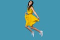 Full length profile photo of young funny flirty girl jump high good mood rejoicing summer weekend vacation wear spring