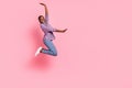 Full length profile portrait of active carefree person jump empty space isolated on pink color background