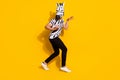 Full length profile side photo of thief guy in zebra mask escape house look empty space isolated over shine yellow color