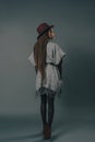 full length rear view of stylish young african american woman in hat standing Royalty Free Stock Photo