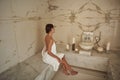 Full length of relaxed lady enjoying hammam alone Royalty Free Stock Photo