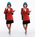 Full length 20s young Asian engineer architect Woman wear hardhat, thinking work hard Royalty Free Stock Photo