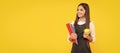 Full length of schoolchild, teenage student girl with school bag backpack hold aplle. Portrait of schoolgirl student Royalty Free Stock Photo