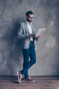 Full length of serious confident concentrated bearded man in for Royalty Free Stock Photo