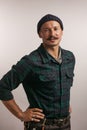 Caucasian craftsman standing confidently with his arms folded isolated over white studio background looking at camera Royalty Free Stock Photo