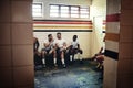 Winner sit here. Full length shot of a group of handsome young rugby players having a chat while sitting together in a Royalty Free Stock Photo