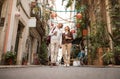 Full Length Shot Of Happy Senior Tourists Couple Walking Outdoors