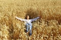 Full length shot of a pretty teenage girl enjoying the outdoors. Caucasian girl wearing a blue jeans and white  shirt relax. Royalty Free Stock Photo