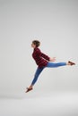 Young sporty girl doing splits in the air at studio Royalty Free Stock Photo