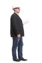 Full length side view portrait of young engineer wearing a white Royalty Free Stock Photo