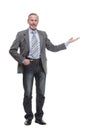 Full length of smiling senior business man giving thumb up and holding a hand into suit pocket Royalty Free Stock Photo