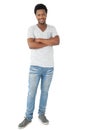 Full length of a smiling young man with arms crossed Royalty Free Stock Photo