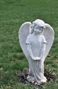 Full Length Statue of a Female Child Angel Statue in a Cemetery Royalty Free Stock Photo