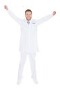 Successful Young Male Doctor With Arms Raised Royalty Free Stock Photo