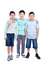 Full length of three school boy over white
