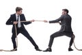 full length . two smiling businessmen pulling the rope. Royalty Free Stock Photo