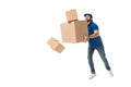full length view of delivery man holding stacked cardboard boxes falling Royalty Free Stock Photo